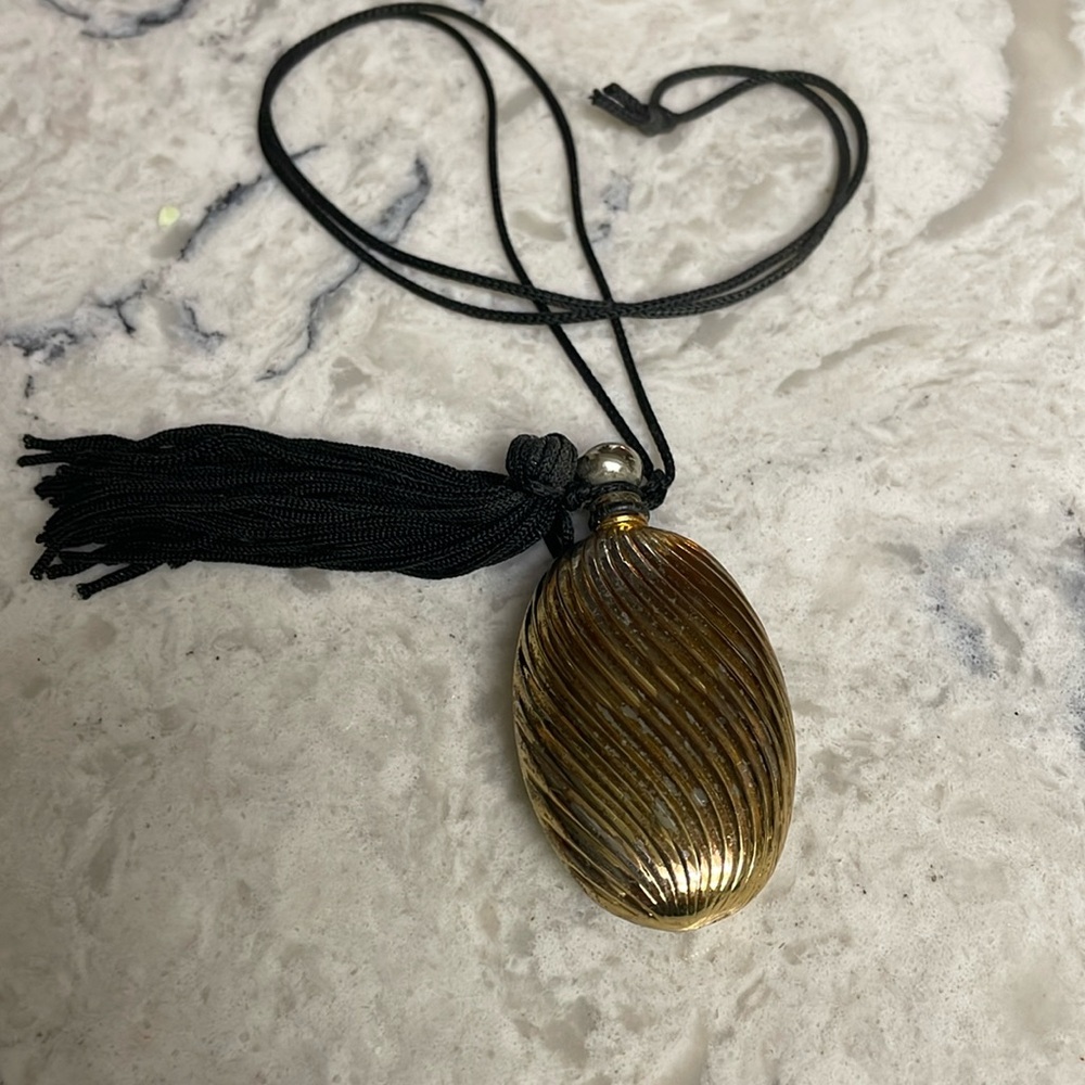 Tiffany and Co Sterling Silver with gold perfume or oil bottle with silk cord